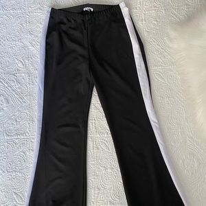 Black bellbottom pants with white stripes